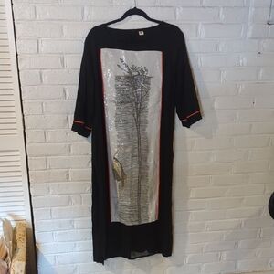 Elegant Black Kurti With Red Trim And Sequin Panel